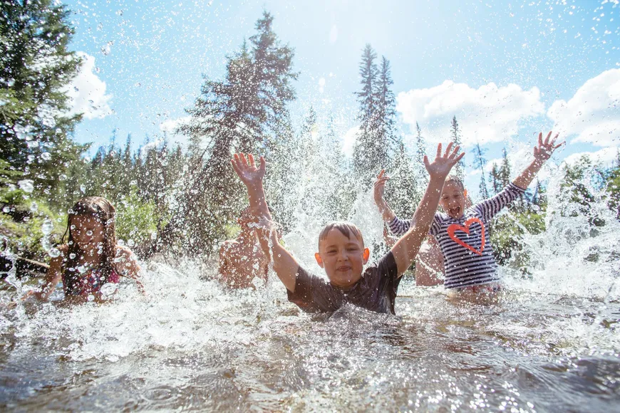 Free range kids frolic in the river